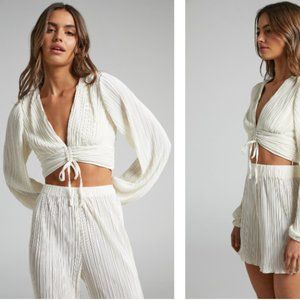 SHOWPO JONDRA RUCHED FRONT LONG SLEEVE PLISSE BLOUSE IN CREAM